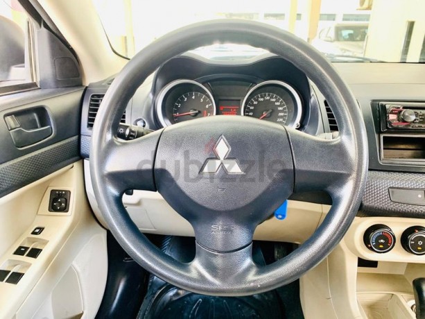 mitsubishi-lancer-ex-16-model-2014-gcc-specs-less-km-big-0