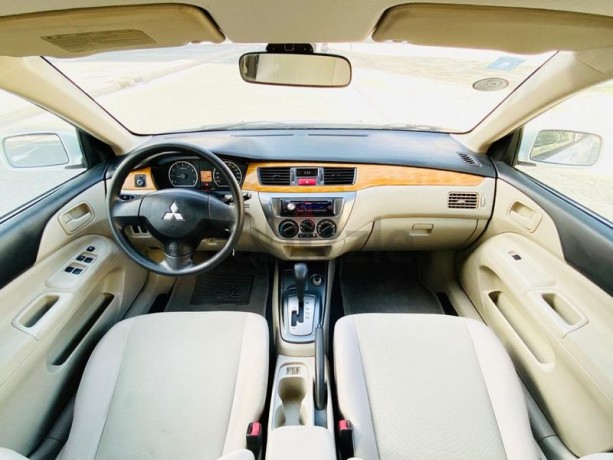 brand-new-condition-mitsubishi-lancer-glx-2011-white-gcc-specs-very-less-km-in-excellent-condition-big-13