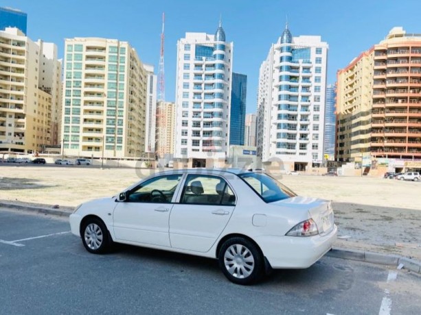 brand-new-condition-mitsubishi-lancer-glx-2011-white-gcc-specs-very-less-km-in-excellent-condition-big-12