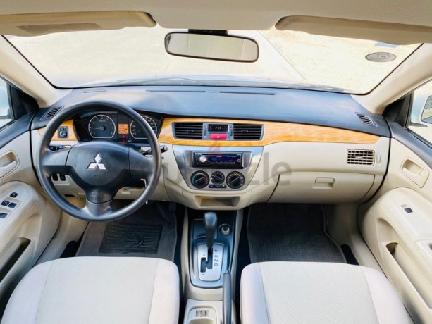brand-new-condition-mitsubishi-lancer-glx-2011-white-gcc-specs-very-less-km-in-excellent-condition-big-11