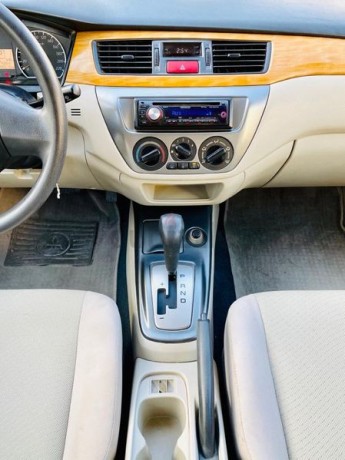 brand-new-condition-mitsubishi-lancer-glx-2011-white-gcc-specs-very-less-km-in-excellent-condition-big-7