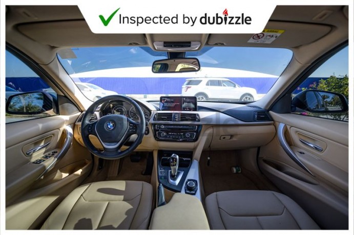 aed1435month-2017-bmw-318i-m-kit-15l-full-service-history-gcc-specs-big-6