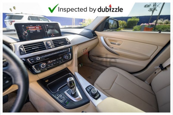 aed1435month-2017-bmw-318i-m-kit-15l-full-service-history-gcc-specs-big-5