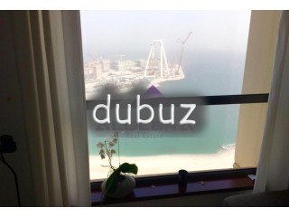 Magnificent view of Dubai Eye, Palm and sea - top floor