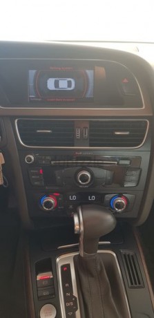 audi-a5-coupe-black-exterior-beige-interior-big-2