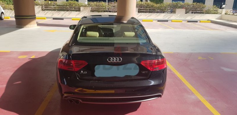 audi-a5-coupe-black-exterior-beige-interior-big-1