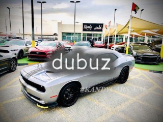 
                            
                            REAR WHEEL DRIVE / 20 CUSTOM RIMS / RED LEATHER INTERIOR / BODY GRAPHICS / BODY KIT
                            
                        