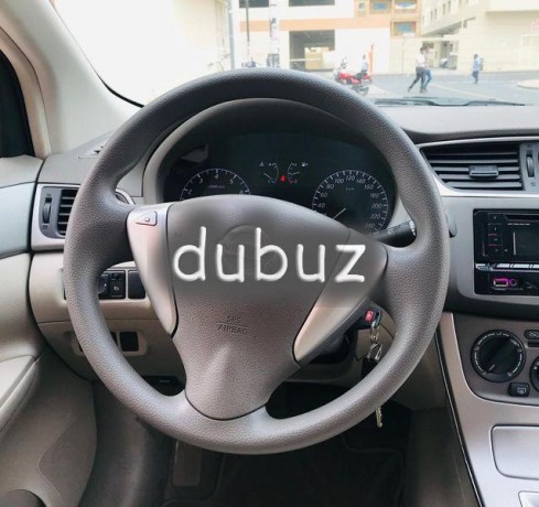 a-well-kept-nissan-tiida-hatchback-model-2015-gcc-specification-big-6