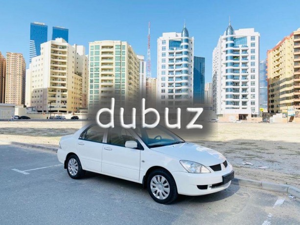 brand-new-condition-mitsubishi-lancer-glx-2011-white-gcc-specs-very-less-km-in-excellent-condition-big-18