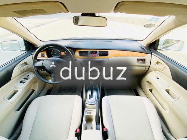 brand-new-condition-mitsubishi-lancer-glx-2011-white-gcc-specs-very-less-km-in-excellent-condition-big-13