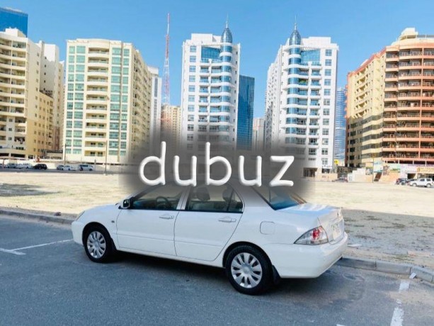 brand-new-condition-mitsubishi-lancer-glx-2011-white-gcc-specs-very-less-km-in-excellent-condition-big-12
