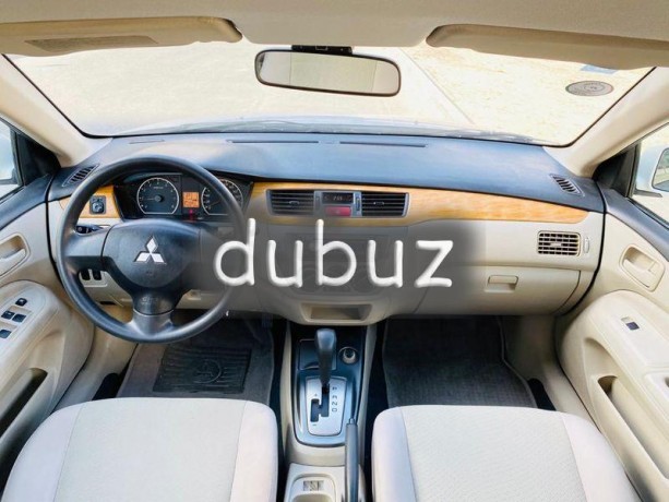 brand-new-condition-mitsubishi-lancer-glx-2011-white-gcc-specs-very-less-km-in-excellent-condition-big-11