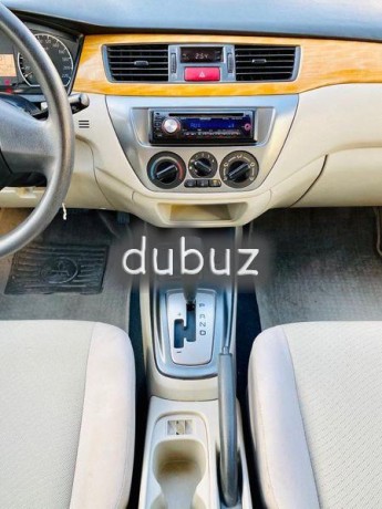 brand-new-condition-mitsubishi-lancer-glx-2011-white-gcc-specs-very-less-km-in-excellent-condition-big-7