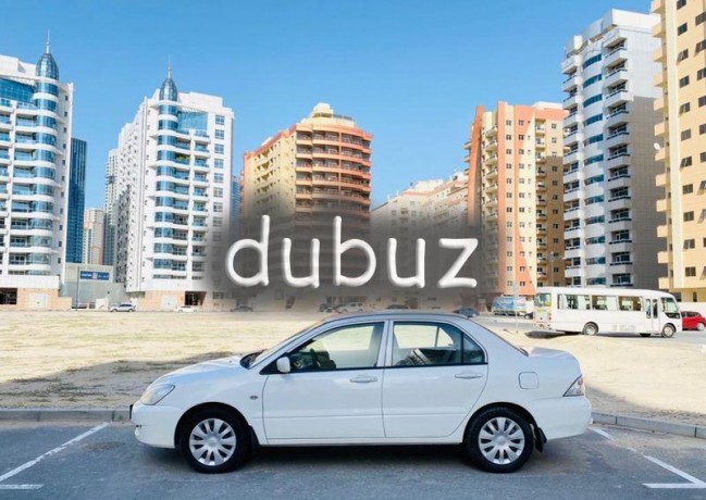 brand-new-condition-mitsubishi-lancer-glx-2011-white-gcc-specs-very-less-km-in-excellent-condition-big-6