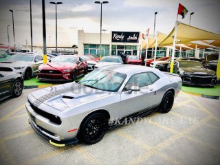 
                            
                            REAR WHEEL DRIVE / 20 CUSTOM RIMS / RED LEATHER INTERIOR / BODY GRAPHICS
                            
                        